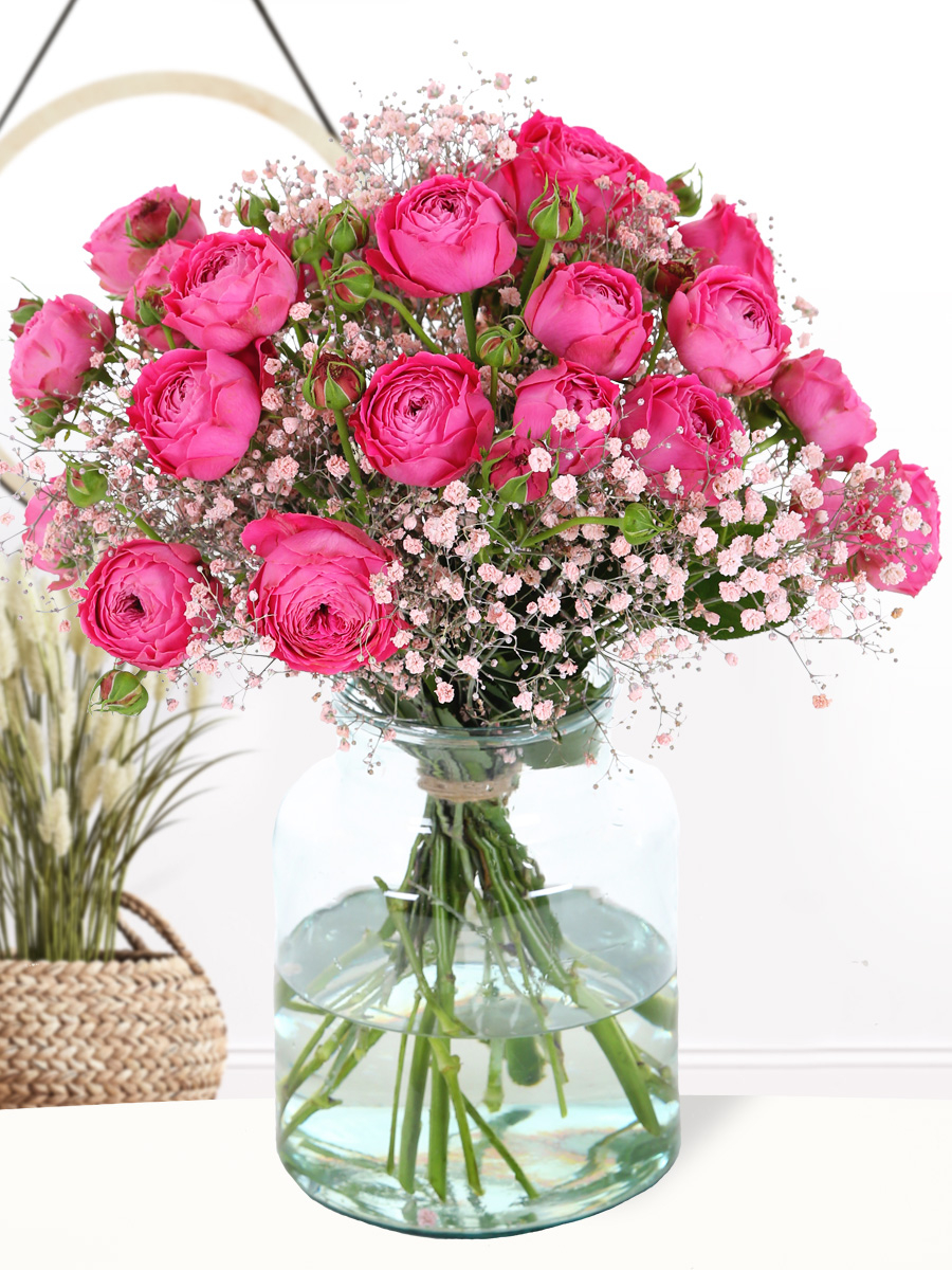 Pink spray roses with gypsophila
