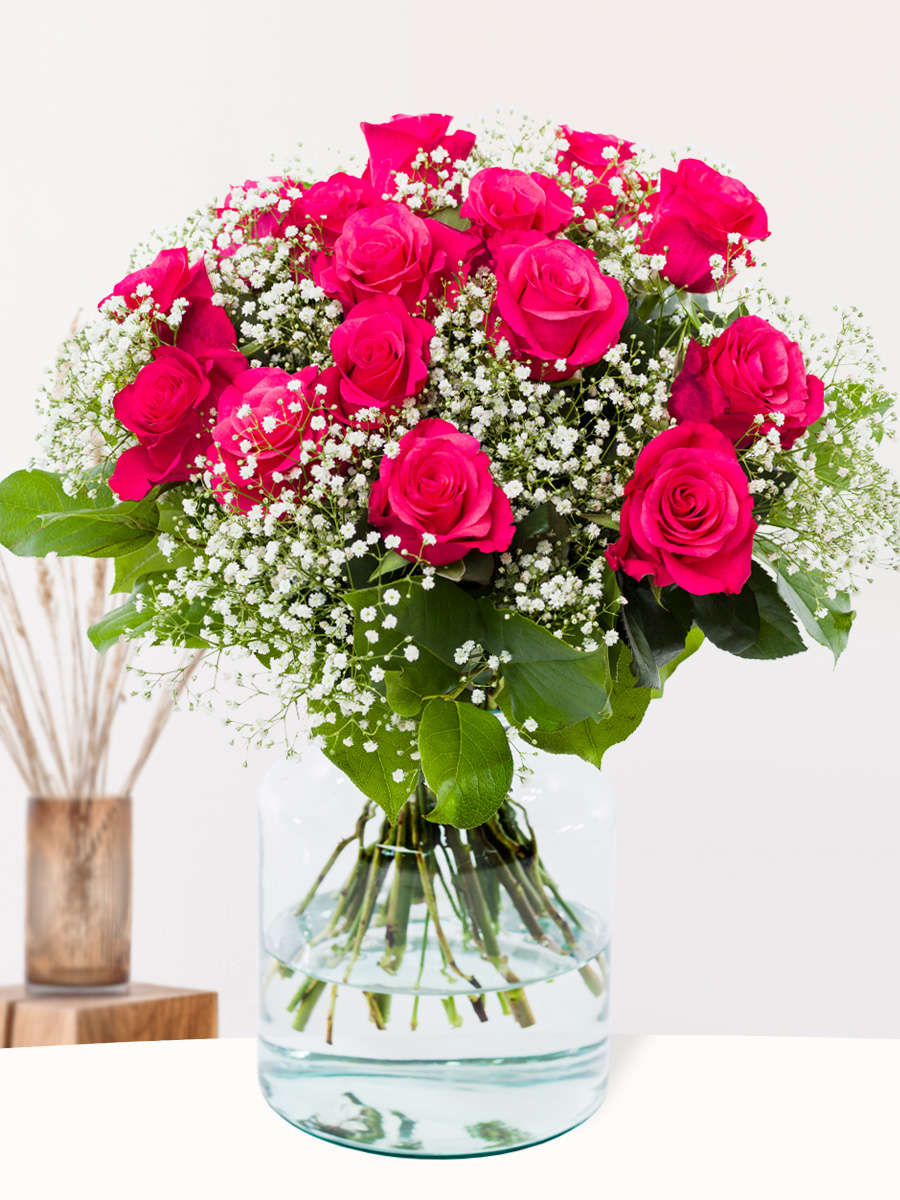 Pink Tacazzi roses with gypsophila