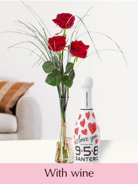 Three red roses with vase and wine