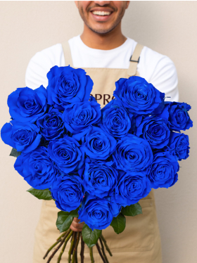 Bouquet of blue roses in heart shape