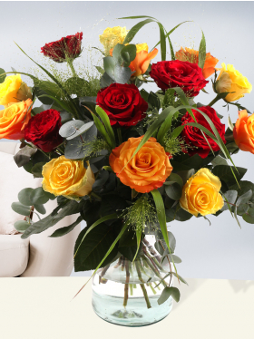 Mixed bouquet yellow-orange-red with panicum and eucalyptus