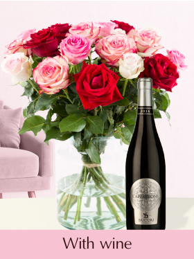 Pink-red rose bouquet inlcuding red wine