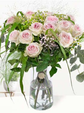 Summer bouquet pink roses with camomile