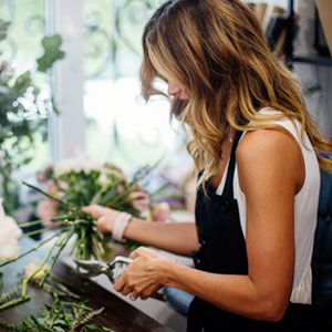 Florist with a rose bouquet Florist with a rose bouquet