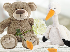 Stuffed animals and a rose